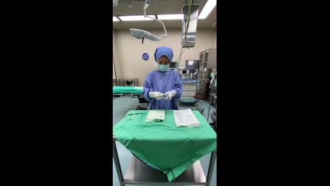 DR 隔離衣繞帶.MOV